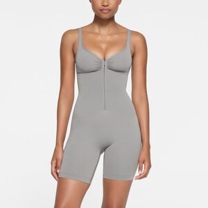 SEAMLESS SCULPT ZIP FRONT MID THIGH BODYSUIT | PACIFIC
